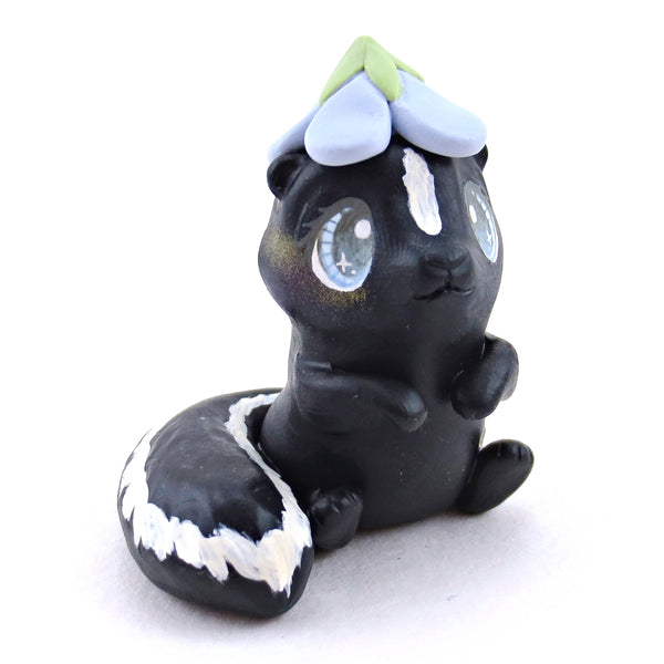 Skunk with a Bluebell Hat Figurine - Polymer Clay Spring Animal Collection
