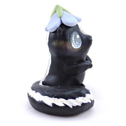 Skunk with a Bluebell Hat Figurine - Polymer Clay Spring Animal Collection