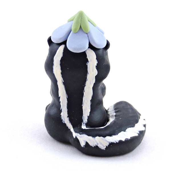 Skunk with a Bluebell Hat Figurine - Polymer Clay Spring Animal Collection