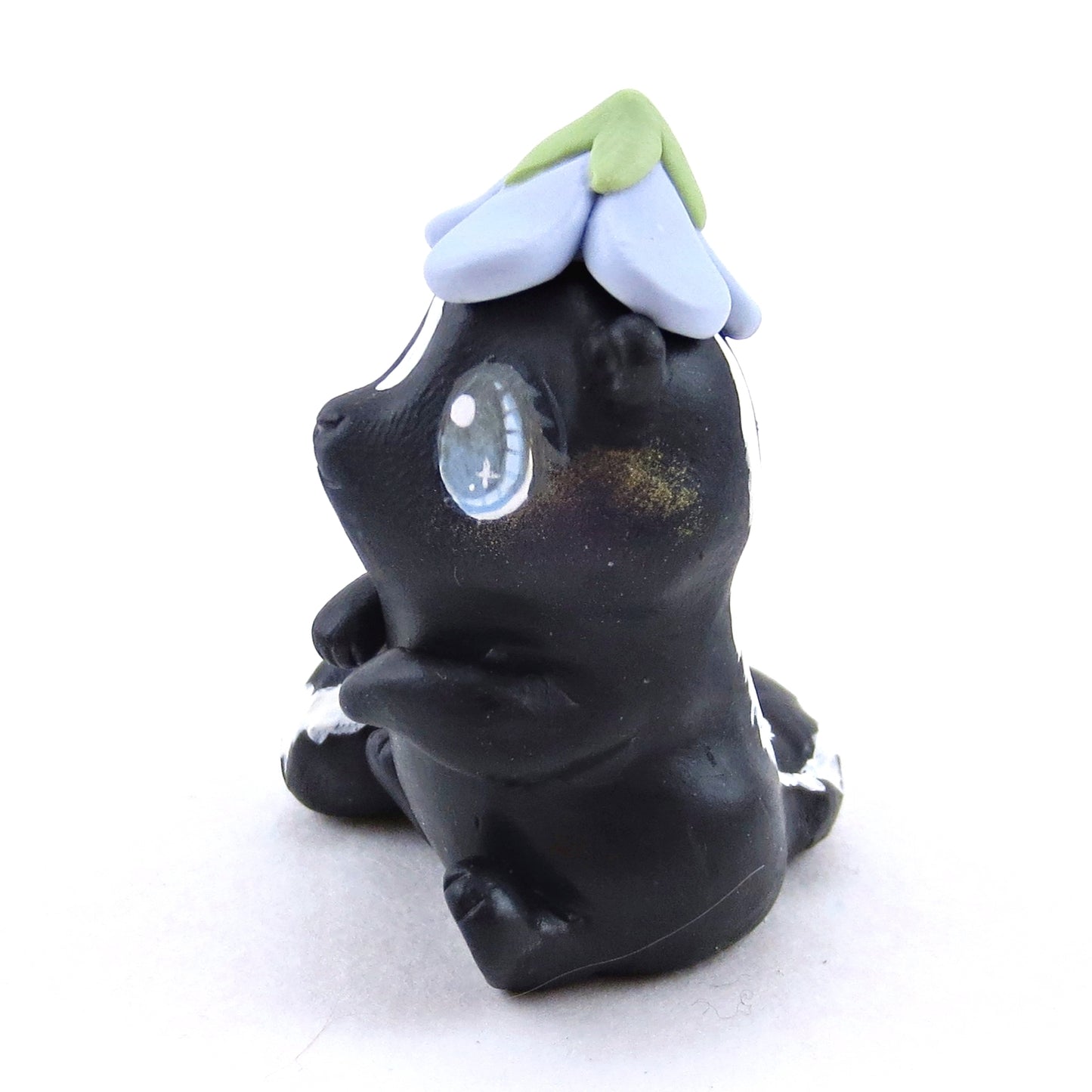 Skunk with a Bluebell Hat Figurine - Polymer Clay Spring Animal Collection